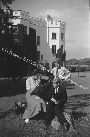 GLIN CASTLE  GROUP IN GARDEN  MADAME AND DESMOND